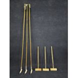 Three polo sticks and three croquet mallets. Polo sticks are L.228cm., Croquet mallets are L.88cm.