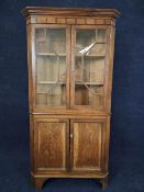 Corner cabinet, floor standing full height Georgian oak in two sections. H.189 W.96 D.50cm.