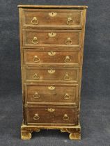 A Georgian country oak tallboy chest. H.120 W.53 D.53cm.