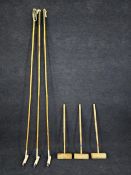 Three polo sticks and three croquet mallets. Polo sticks are L.228cm., Croquet mallets are L.88cm.