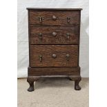 A small mid century oak chest of drawers. H.56 W.35 D.23cm.