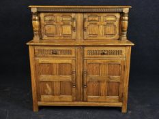 Court cupboard, mid century oak. H.124 W.120 D.44cm.