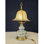 A large Ceramic Faience Quimper style lamp with glass shade. H.86cm.