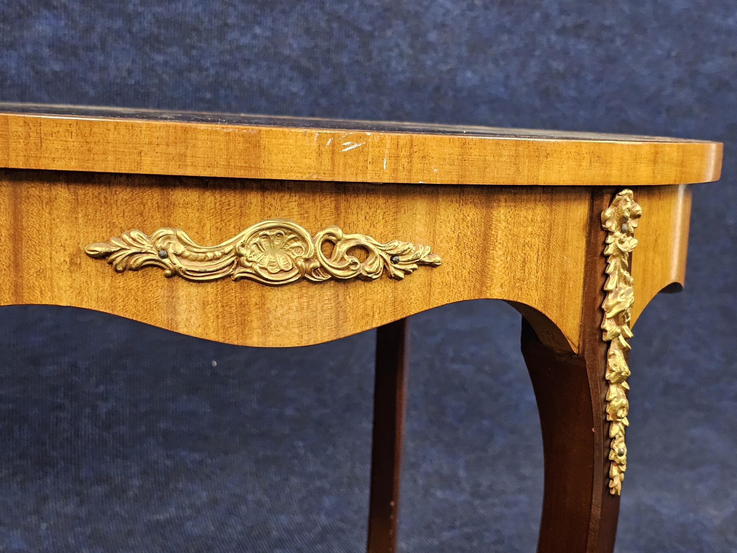 A pair of French style burr walnut lamp tables on cabriole supports with ormolu mounts. H.47 W.56 - Image 2 of 4