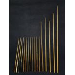 A collection of pool cues and rests. Longest is L.270cm.