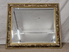 Wall mirror, contemporary with bevelled plate. H.64 W.74cm.