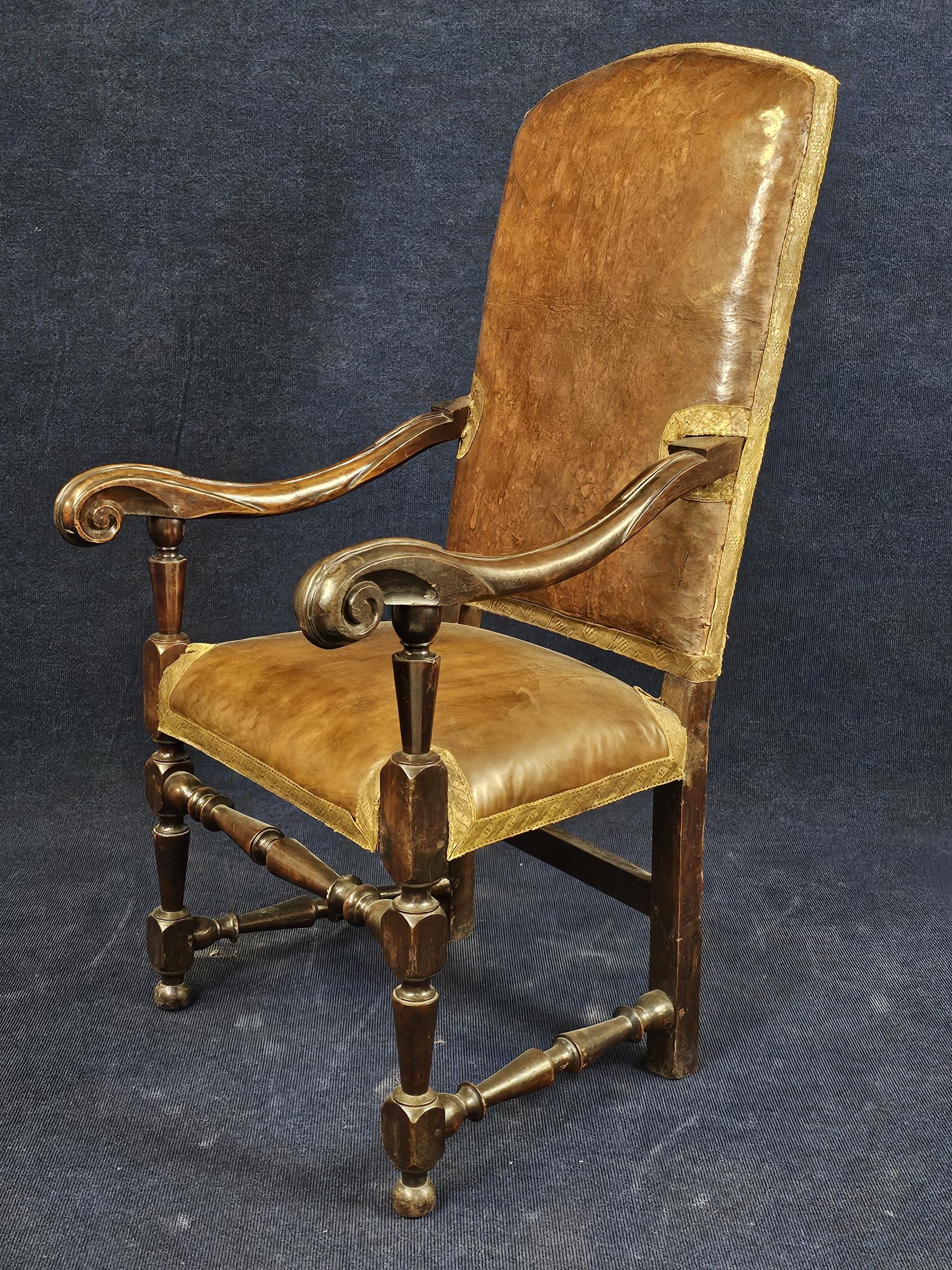 A 19th century Continental carved armchair in leather upholstery. - Image 2 of 6