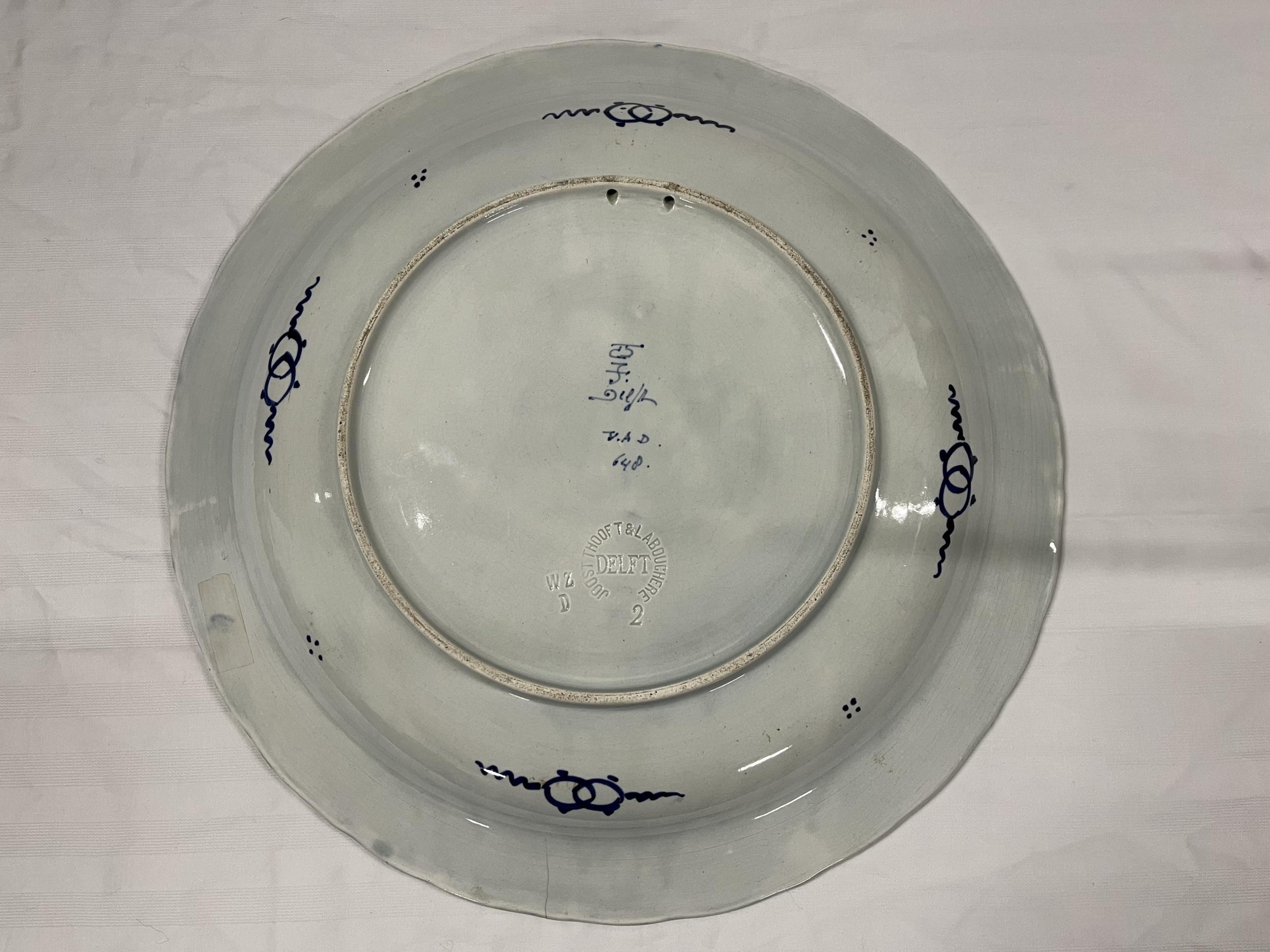 A Delft plate, C.1900, marked Joost Thooft and Labouchere to the underside. (Small hairline crack as - Image 2 of 5