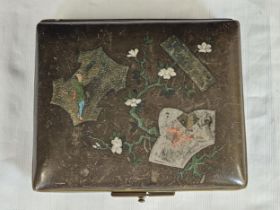 An early 20th century Japanese lacquered and painted cigarette case/purse. Painted with figures