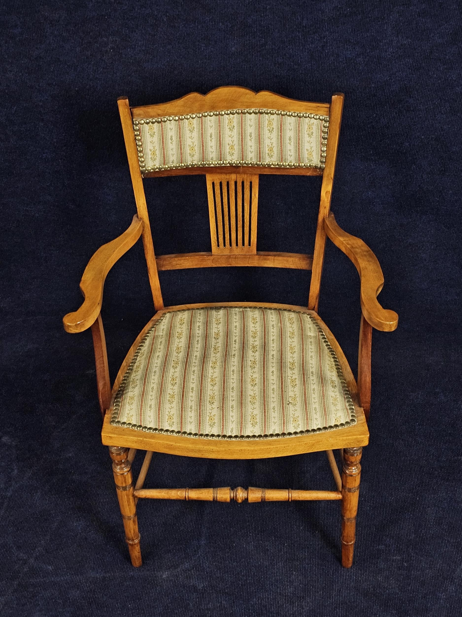 An Edwardian beech armchair. - Image 2 of 7