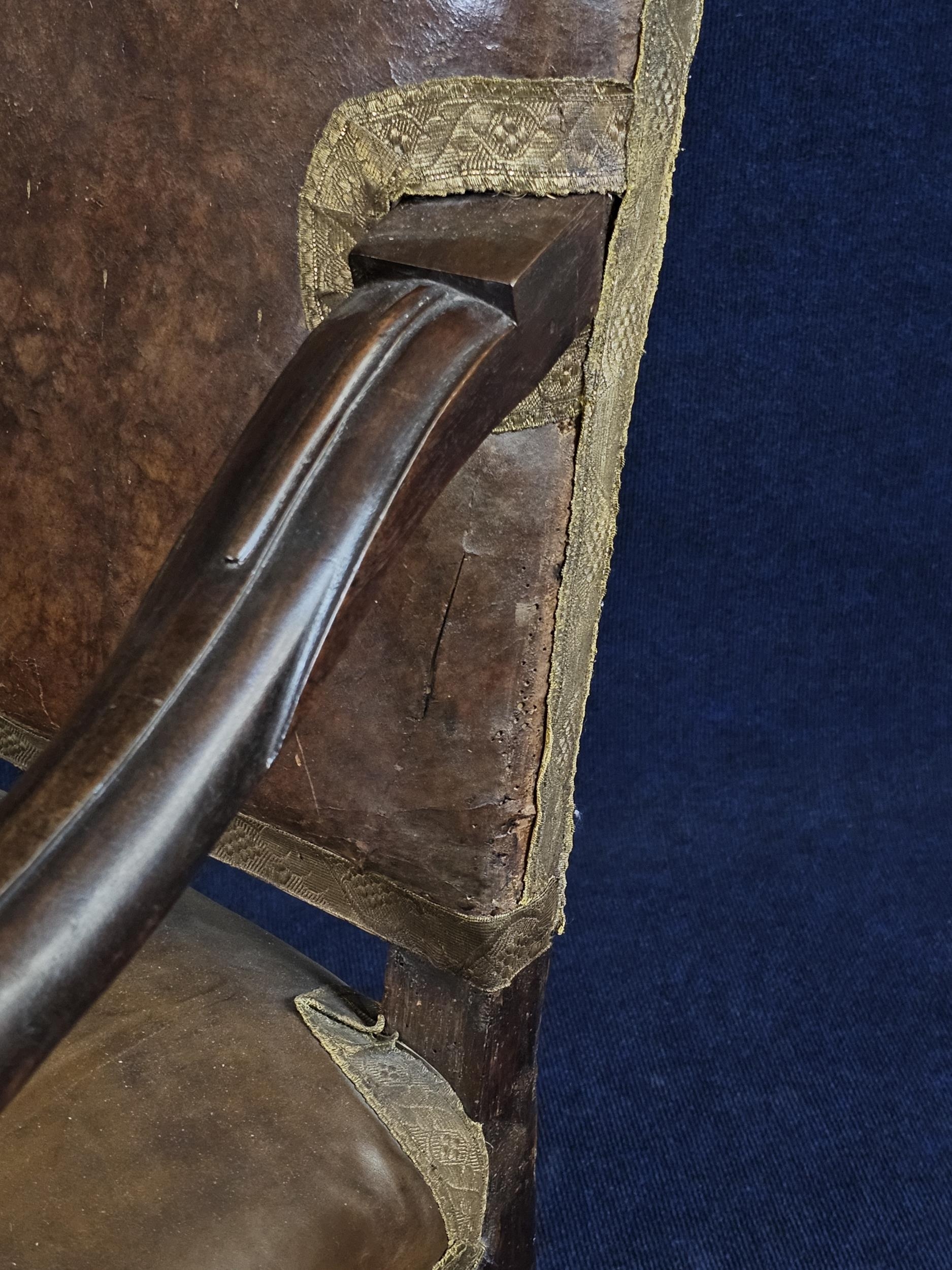 A 19th century Continental carved armchair in leather upholstery. - Image 6 of 6