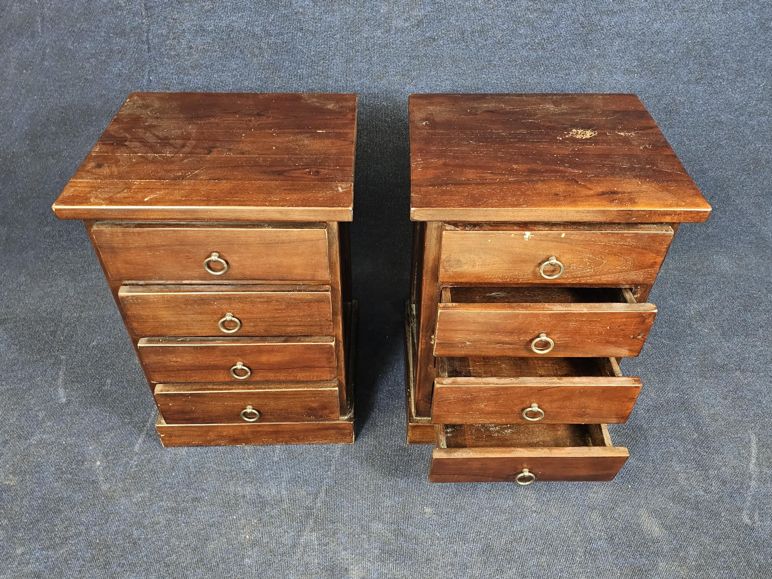 A pair of Eastern teak bedside cabinets. H.66 W.45 D.40 - Image 3 of 4