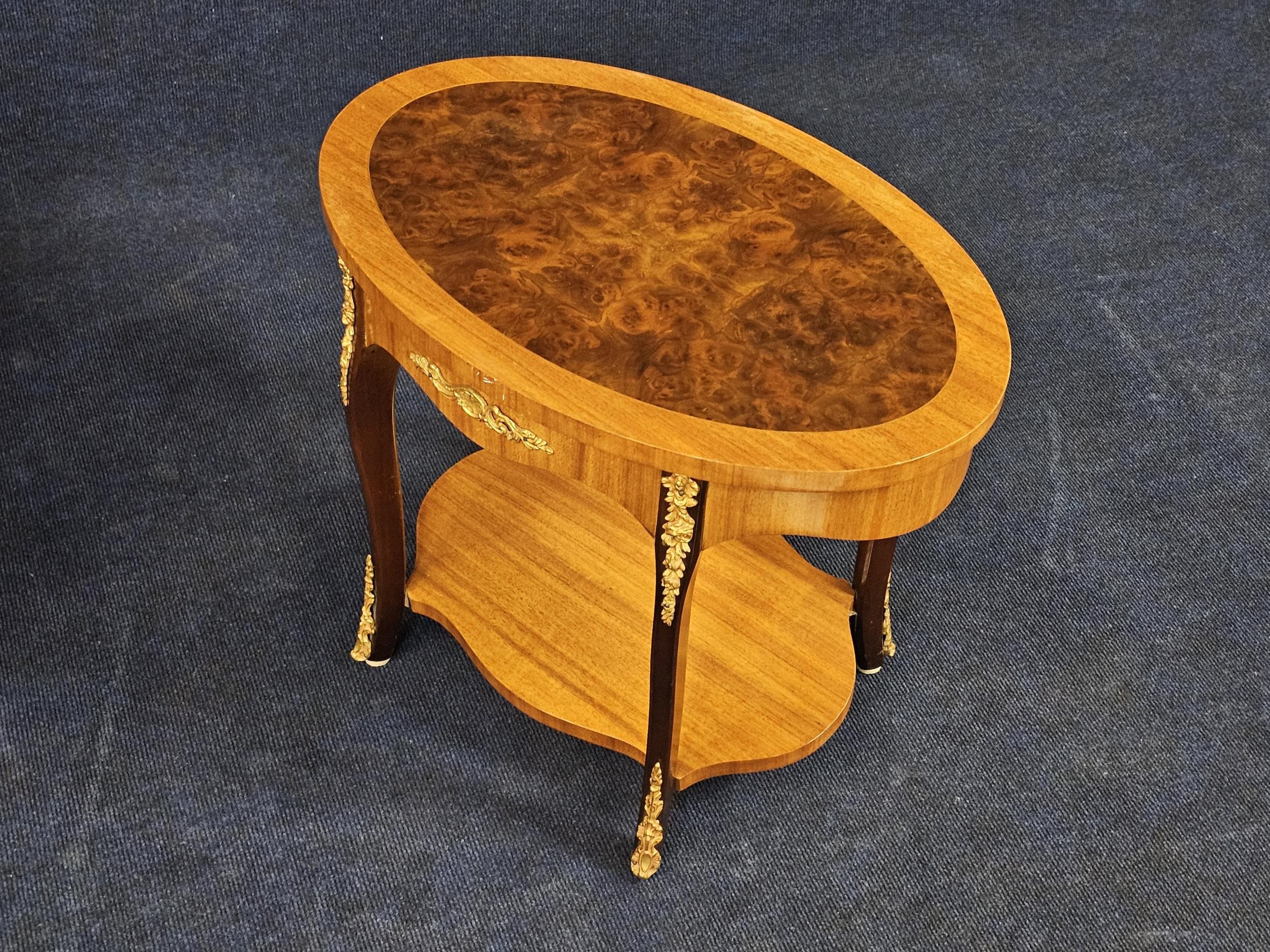 A pair of French style burr walnut lamp tables on cabriole supports with ormolu mounts. H.47 W.56 - Image 4 of 4