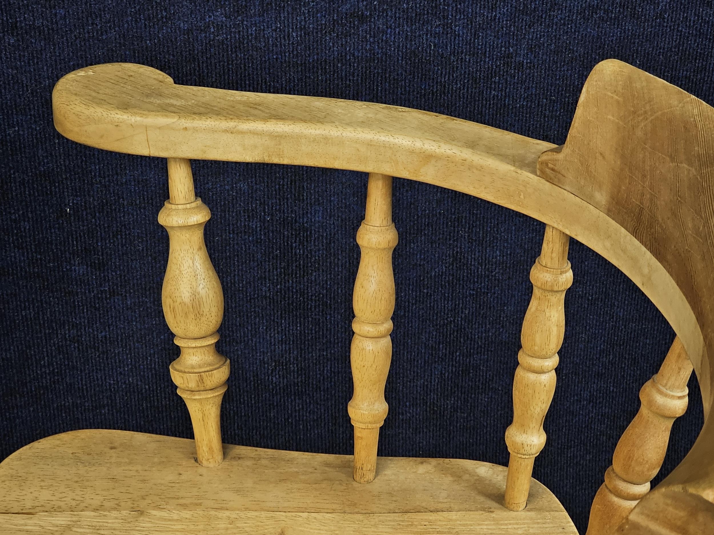 A set of four pitch pine smokers bow back armchairs. - Image 7 of 7