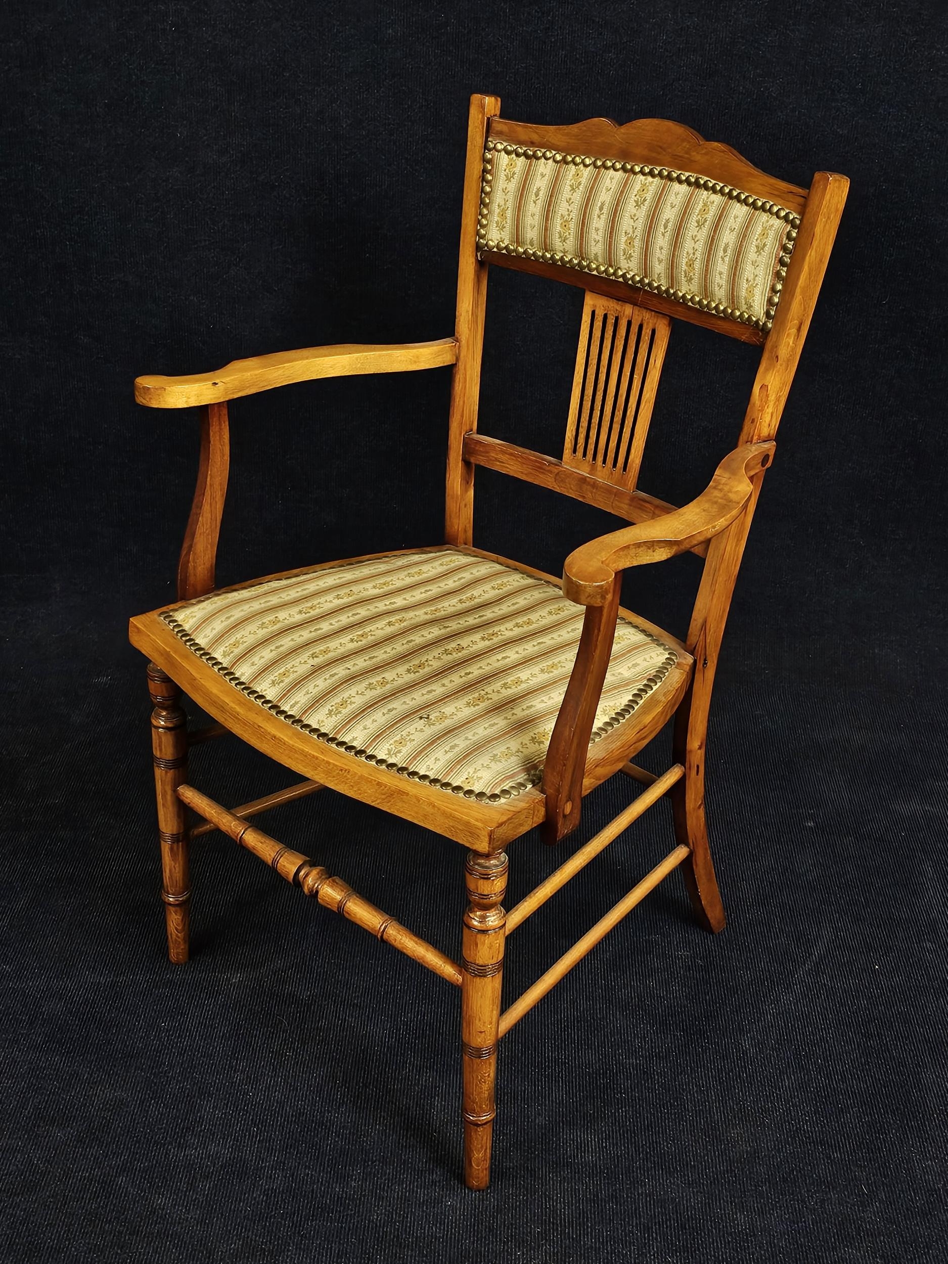 An Edwardian beech armchair. - Image 6 of 7