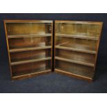 A pair of mid century teak Minty bookcases. H.120 W. 89 D.23cm.