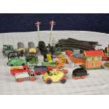 A good collection of die cast models and tin plate toys.