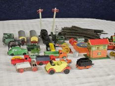 A good collection of die cast models and tin plate toys.
