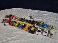 A good collection of die-cast vehicles including 007 and some military models.