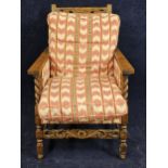 A mid century antique style oak armchair with adjustable back. H.98 W.64 D.90cm.