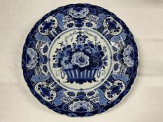 A Delft plate, C.1900, marked Joost Thooft and Labouchere to the underside. (Small hairline crack as