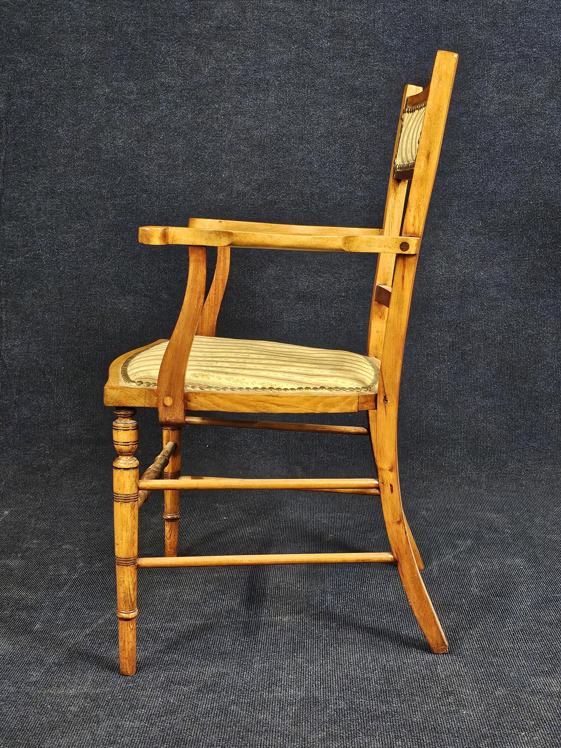 An Edwardian beech armchair. - Image 7 of 7