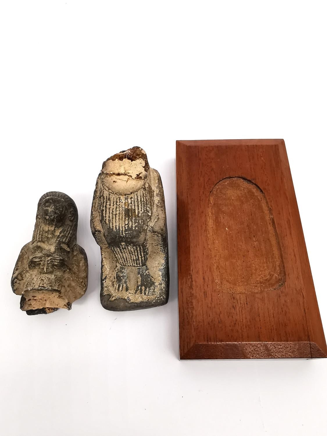 Two Egyptian-style clay ushabti on wooden plinth bases. One lying down and one seated on a - Image 5 of 9
