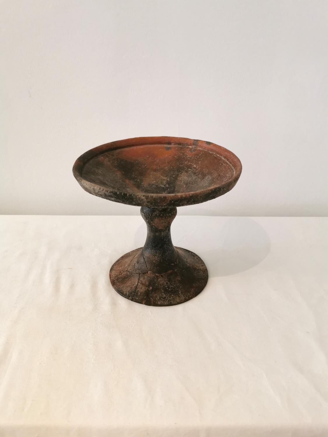 A Pre-Colombian terracotta pedestal dish, with carved and grooved decoration at rim. ( base and - Image 2 of 8