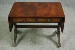 A Regency style mahogany sofa table of small size. H.50 W.113 D.51cm.