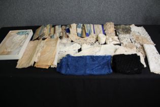 A collection of vintage lace and textiles. L.32 W.21cm. (box).