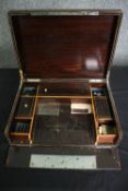 An early 19th century brass inlaid rosewood jewellery box with fall front and fitted interior. H.