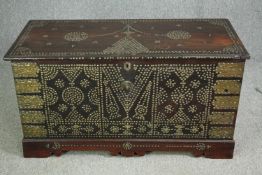 A 19th century Indian rosewood Zanzibar chest with allover studded ornament and fitted interior. H.