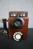 A 1920's vintage GPO wall telephone stamped to the reverse. H.24 W.22 D.20cm.
