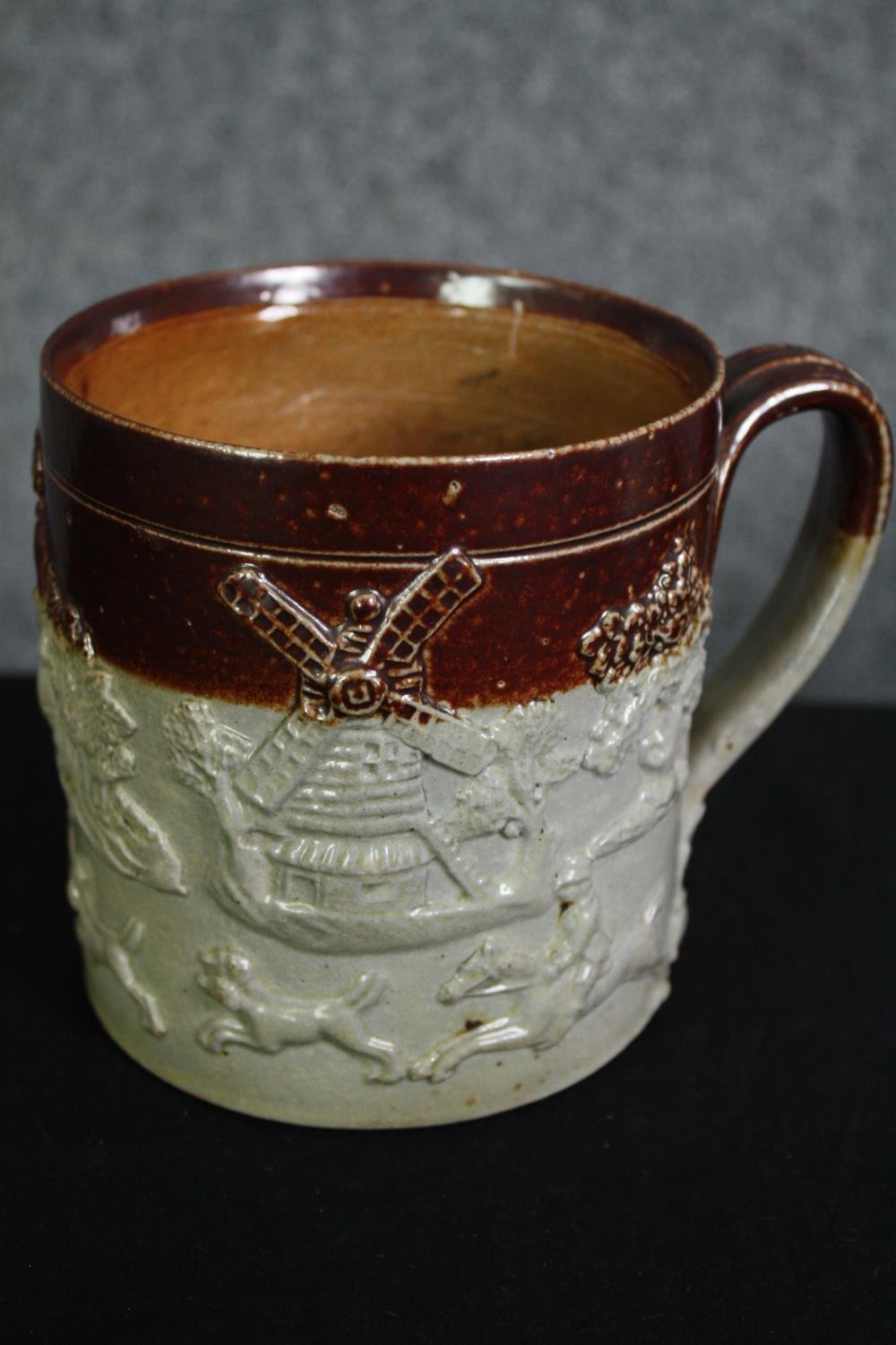 Two 19th century two tone stoneware harvest/hunting mugs of large proportions with moulded sprig - Image 4 of 7