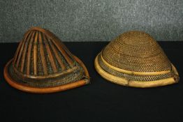 Two Naga hats, woven rattan and bamboo. H.16 W.32 D.25cm. (largest).