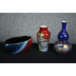 Two Oriental style vases and an art pottery bowl. H.21cm. (largest).