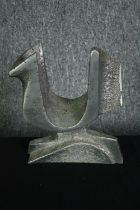 An abstract figure group in aluminium. H.23cm.