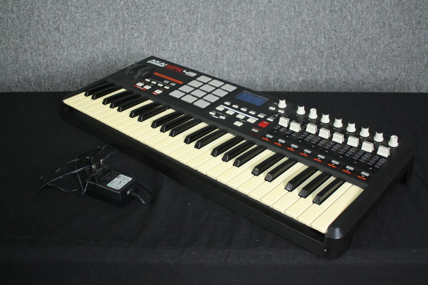 An Akai MPK49 midi keyboard. H.9 W.73 D.30cm. - Image 4 of 8