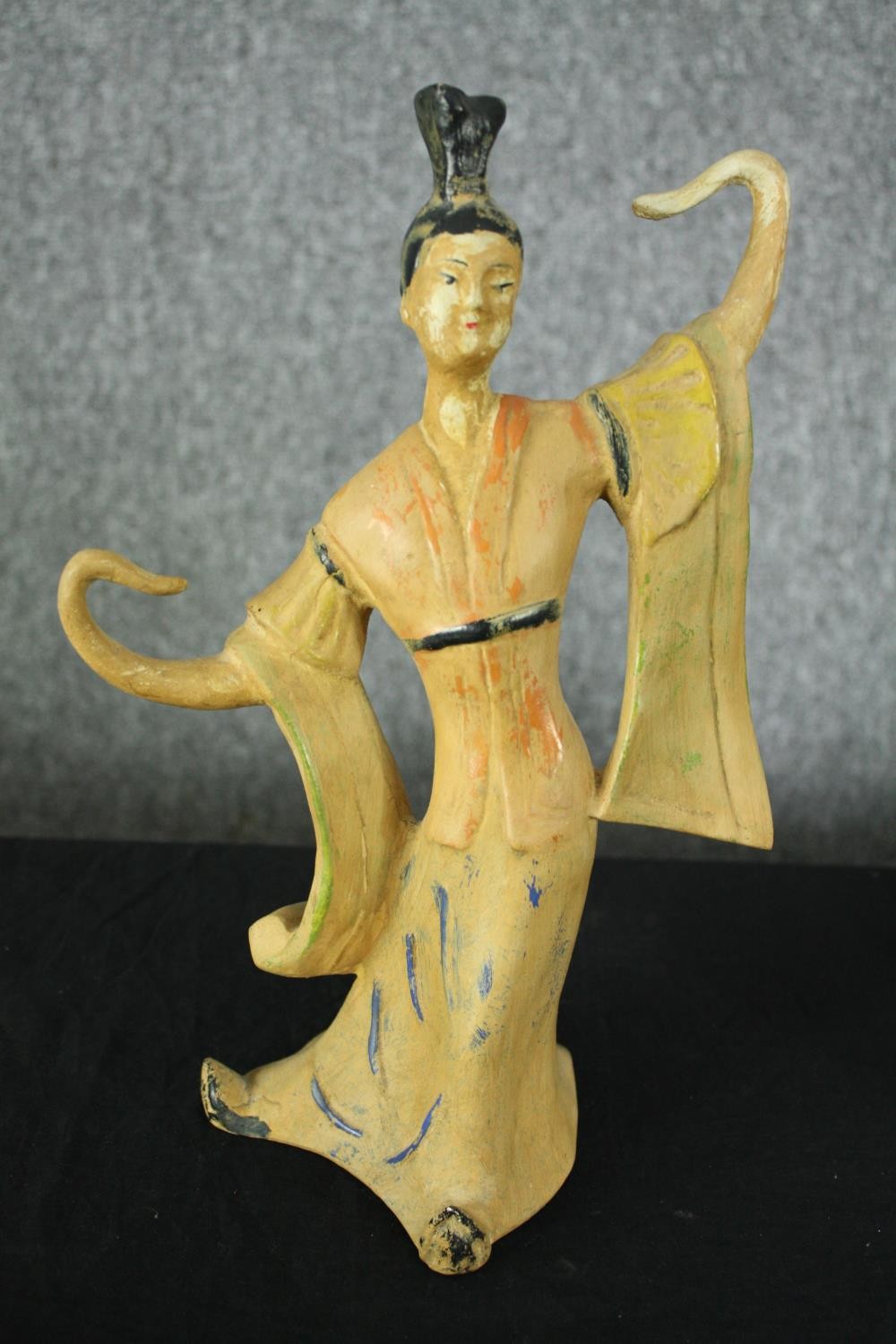 A ceramic dancing Geisha and a carved stone figure. H.31cm. (largest) - Image 2 of 9