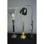 A mid century chrome adjustable desk lamp along with two brass table lamps. H.73cm. (largest)