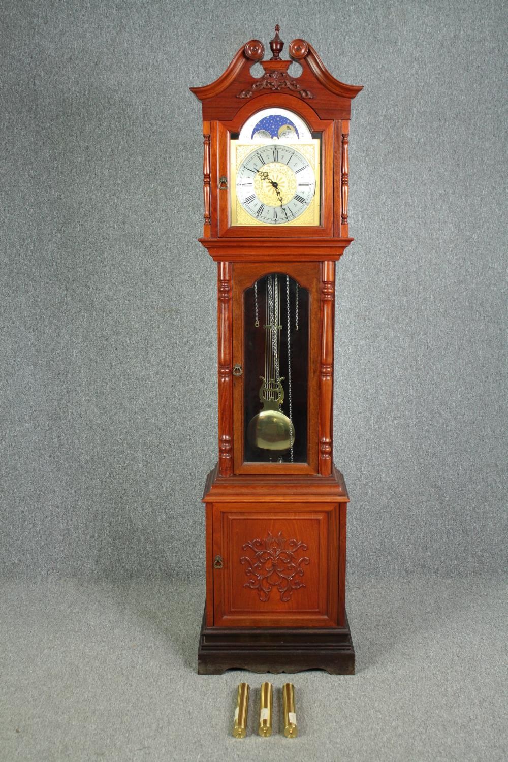 A Georgian style mahogany longcase clock with moonphase and steel and brass engraved face. H.212 W.