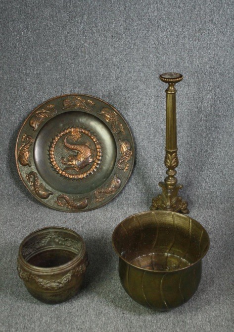 A brass ecclesiastic style candlestick along with two metal pots and a tray. H.71cm. (largest).