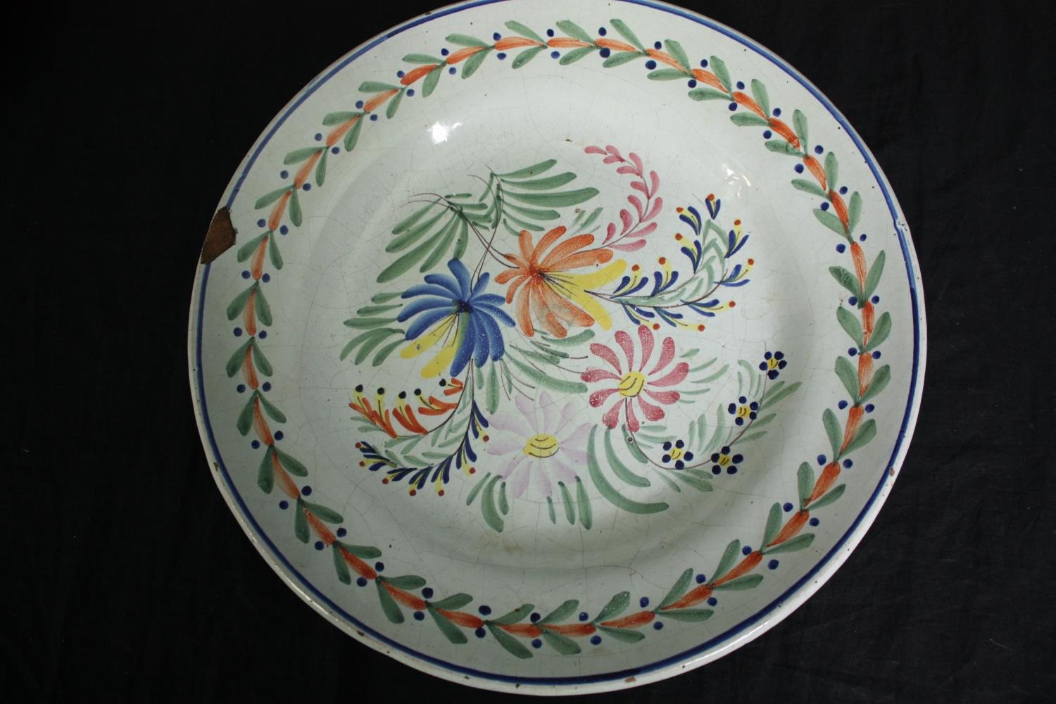 A collection of 19th century faience plates. One damaged. Dia.34cm. (largest). - Image 10 of 11