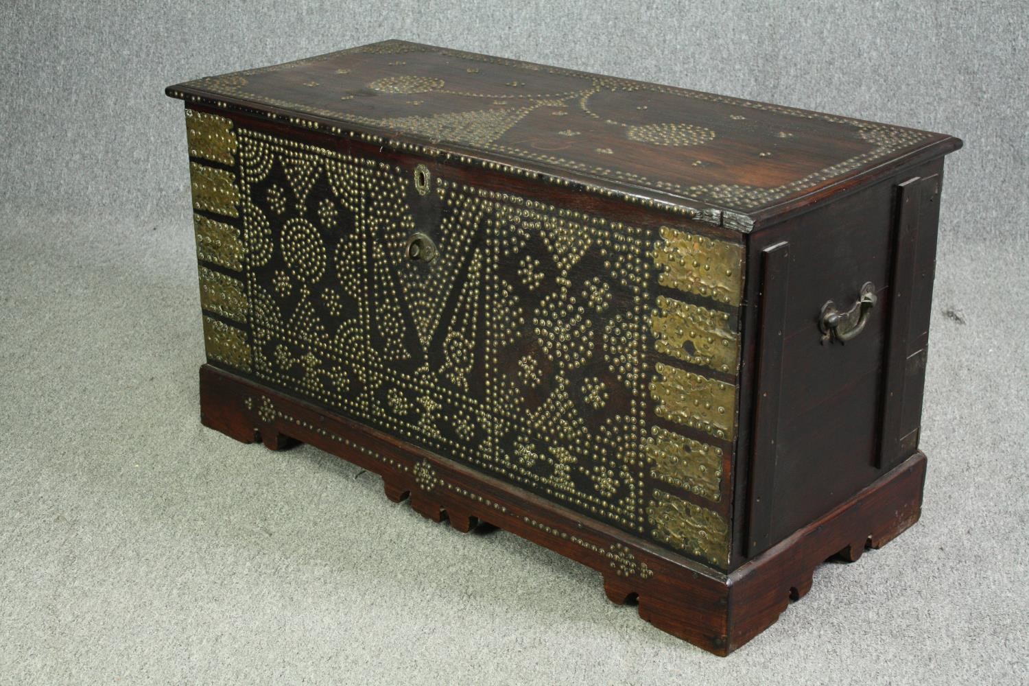 A 19th century Indian rosewood Zanzibar chest with allover studded ornament and fitted interior. H. - Image 3 of 7