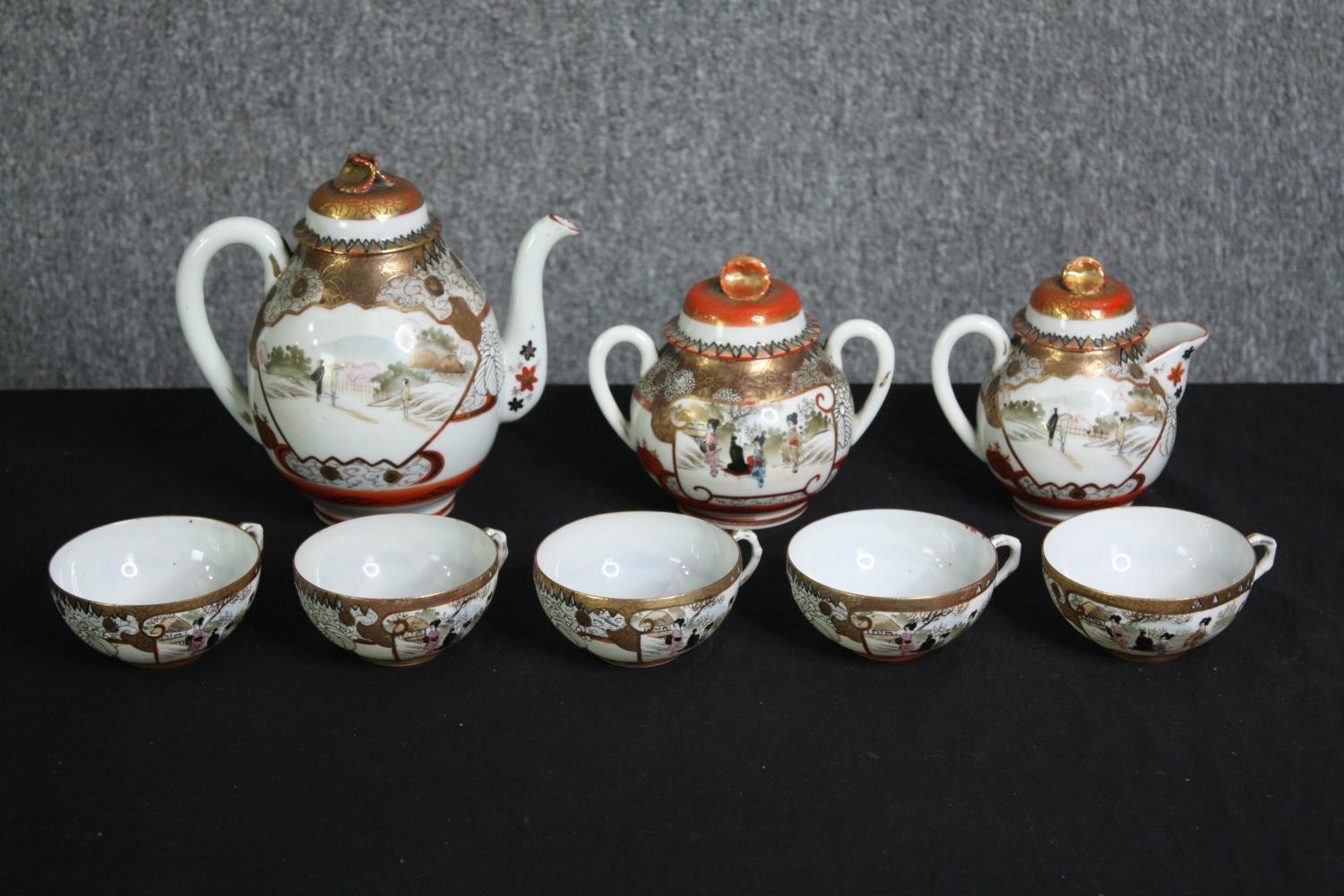 A Japanese Satsuma tea service. H.19cm. (largest).