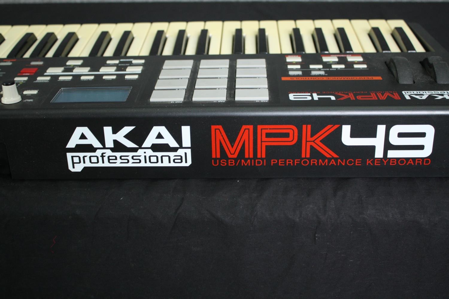 An Akai MPK49 midi keyboard. H.9 W.73 D.30cm. - Image 8 of 8