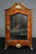 A miniature kingwood and gesso decorated Continental style vitrine. H.40 W.24 D.16cm.