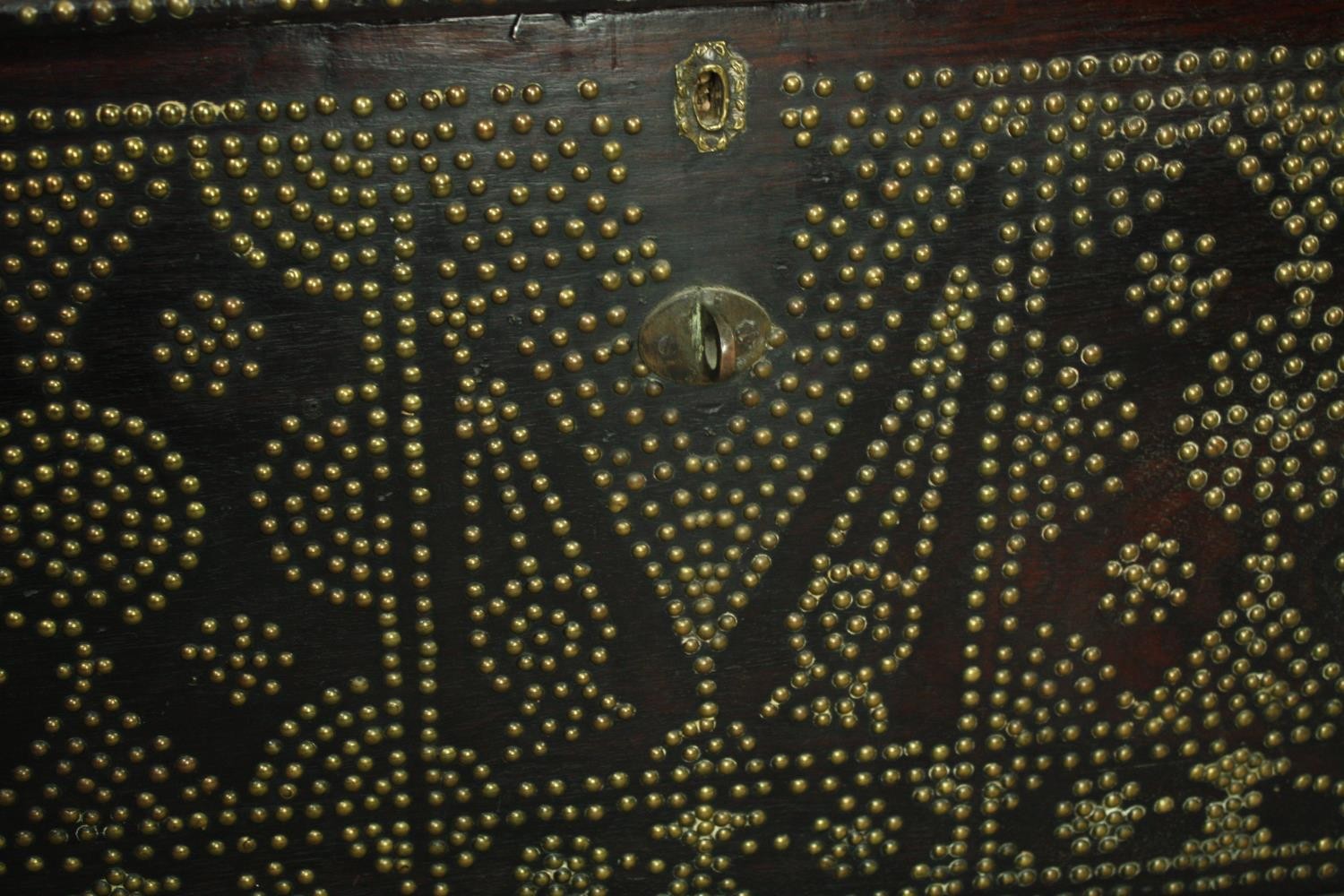 A 19th century Indian rosewood Zanzibar chest with allover studded ornament and fitted interior. H. - Image 7 of 7