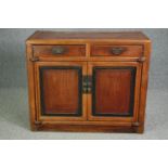Sideboard, Chinese hardwood with ebonised panel doors on block supports. H.88 W.104 D.48cm.
