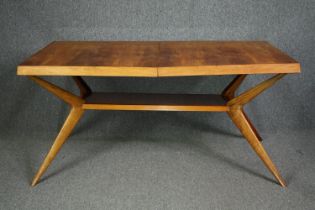 A Romweber style dining table. H.79 W.160 D.93cm. (Fragile and in need or repair).